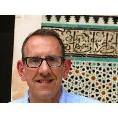 John A. Buscarello, Asid